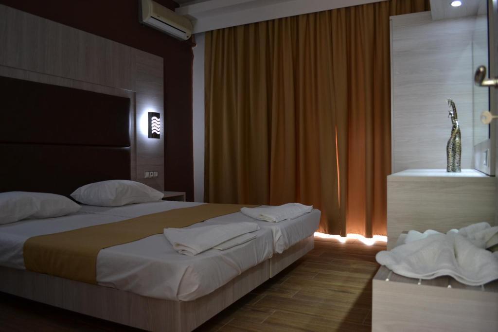 Karavos Hotel Apartments Archangelos  Bagian luar foto